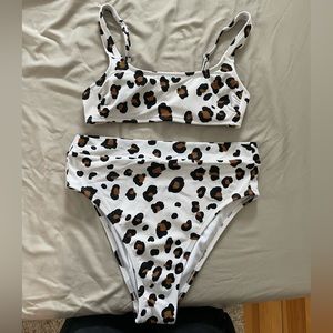 Two piece high waisted bathing suit.  SMALL TOP AND LARGE BOTTOMS.